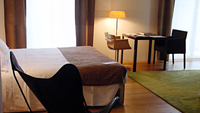 酒店客房，选用柔和的色调，装饰设计简洁大方。