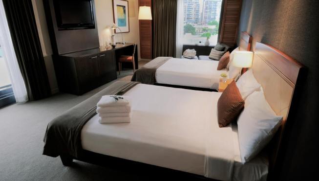 酒店客房，充满现代都市风格的简洁设计，给旅人一个清净的栖居场所。