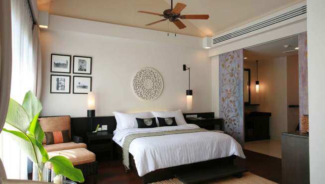 酒店房间—素雅恬淡的装修风格，配清新的绿植，让人即使在炎炎夏日也能感觉到丝丝清凉。