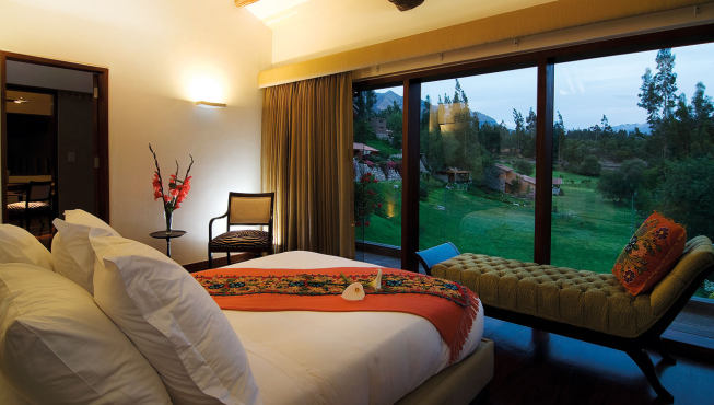 酒店客房——从纯天然取材中感受到绝对的奢华，以及花园精致的景色。